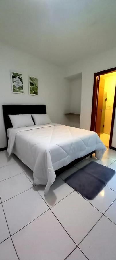 Bliss Hoteis Centro Búzios Extérieur photo A bedroom with a bed and a bathroom