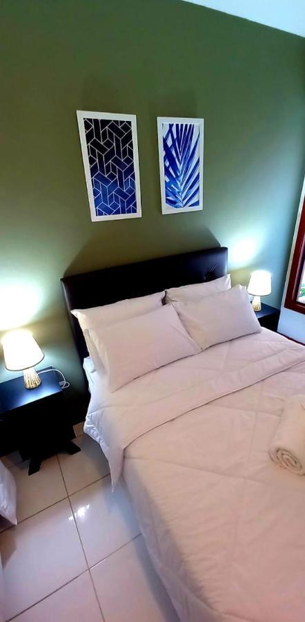Bliss Hoteis Centro Búzios Extérieur photo A bed with two pillows